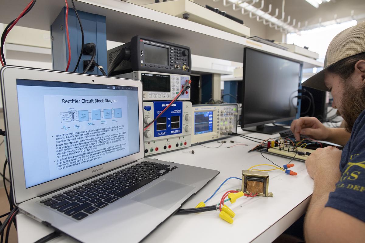 Engineering students work on a project