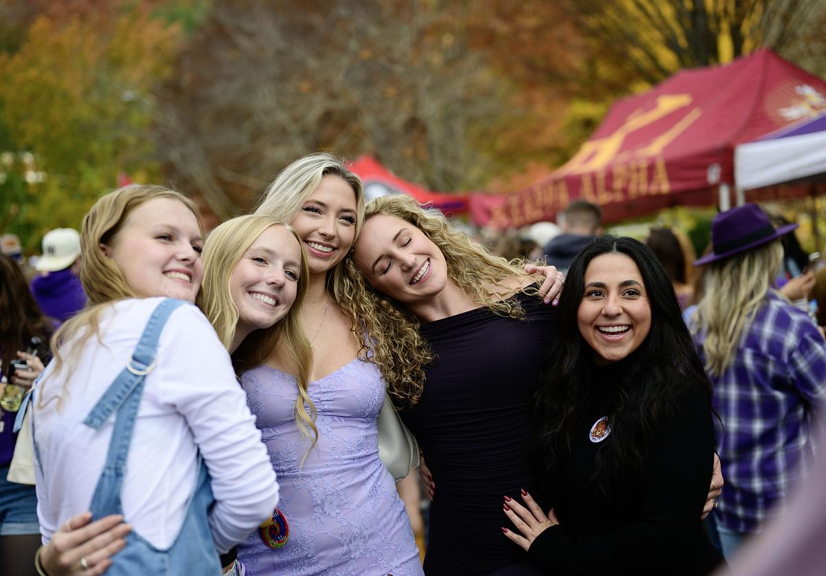 students hugging