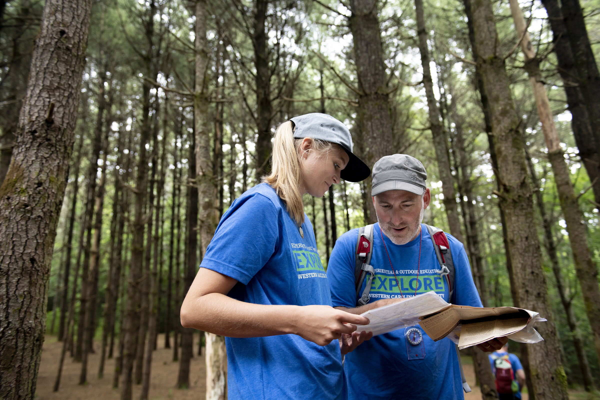 student and professor in the field