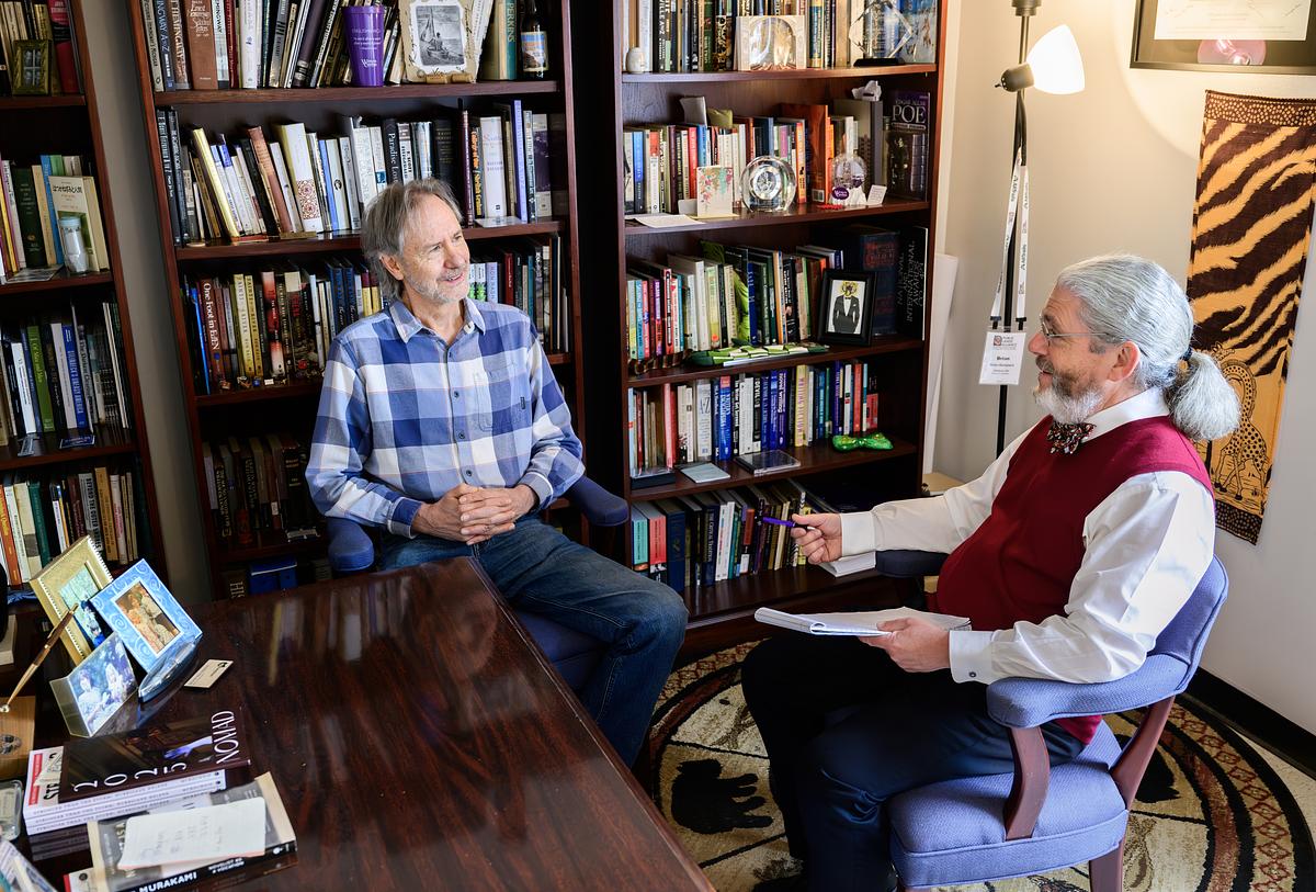 Ron Rash and Brian Railsback in discussion in an office