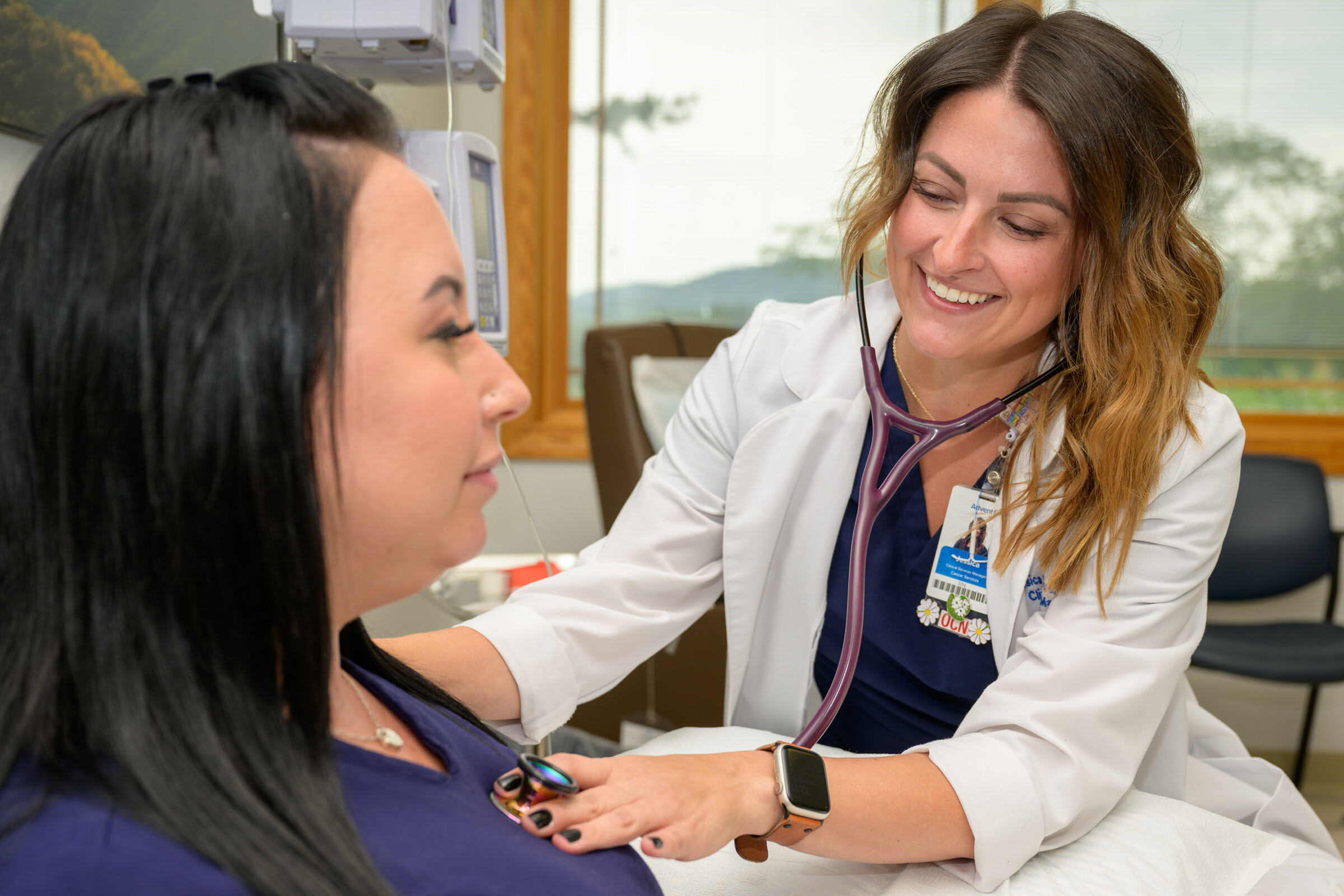 Jessica working with a patient