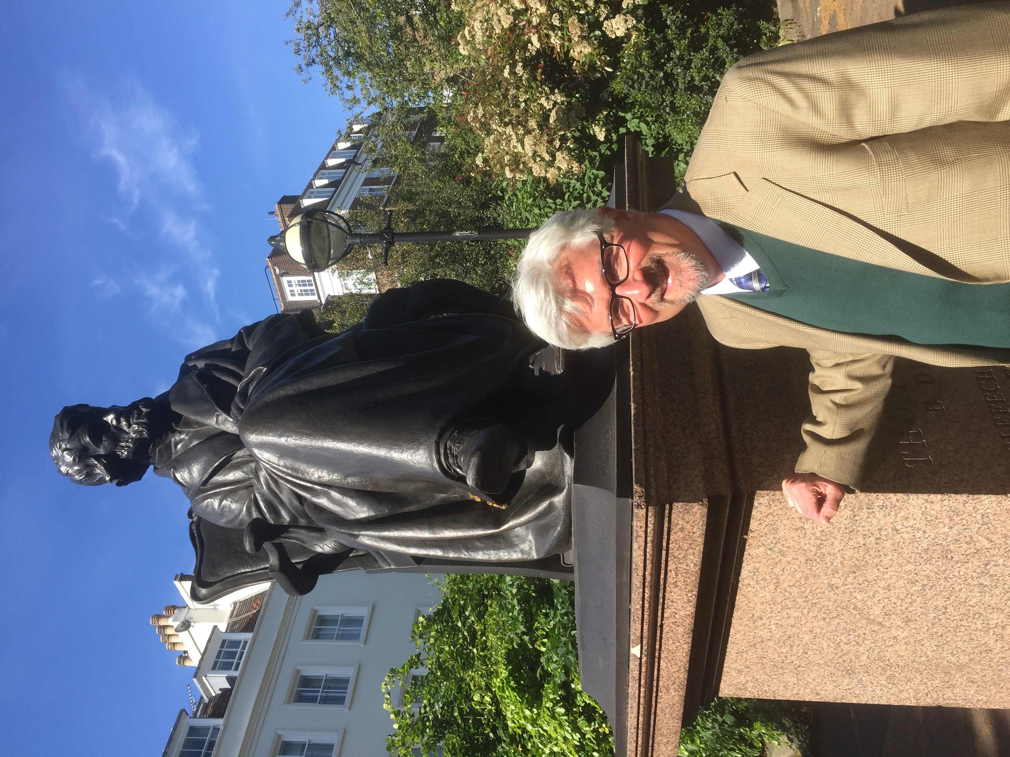 Brent Kinser, Western Carolina University professor of English studies, visits a statue of literary figure Thomas Carylyle in London.