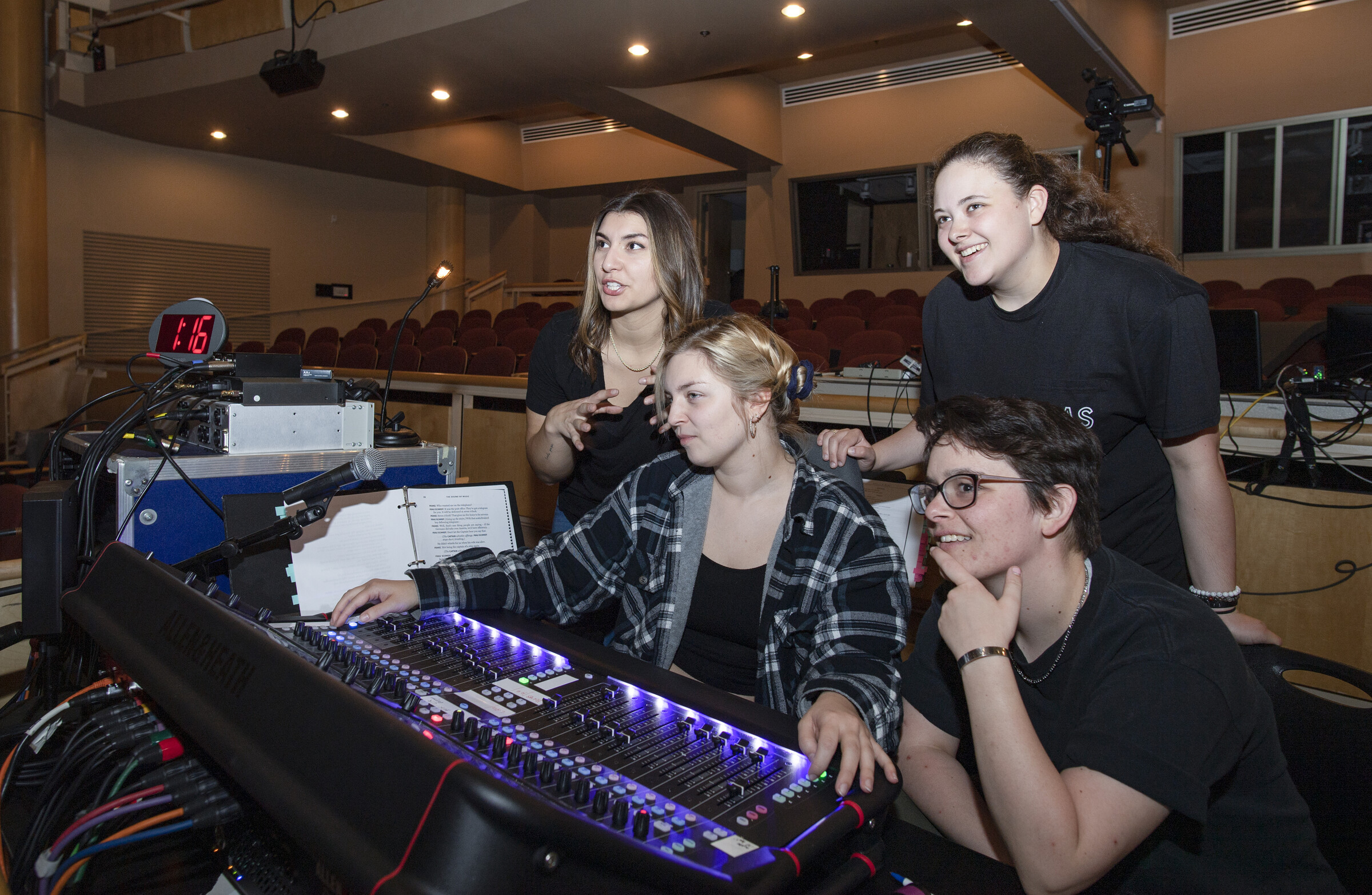 Olivia Ramos works with fellow students