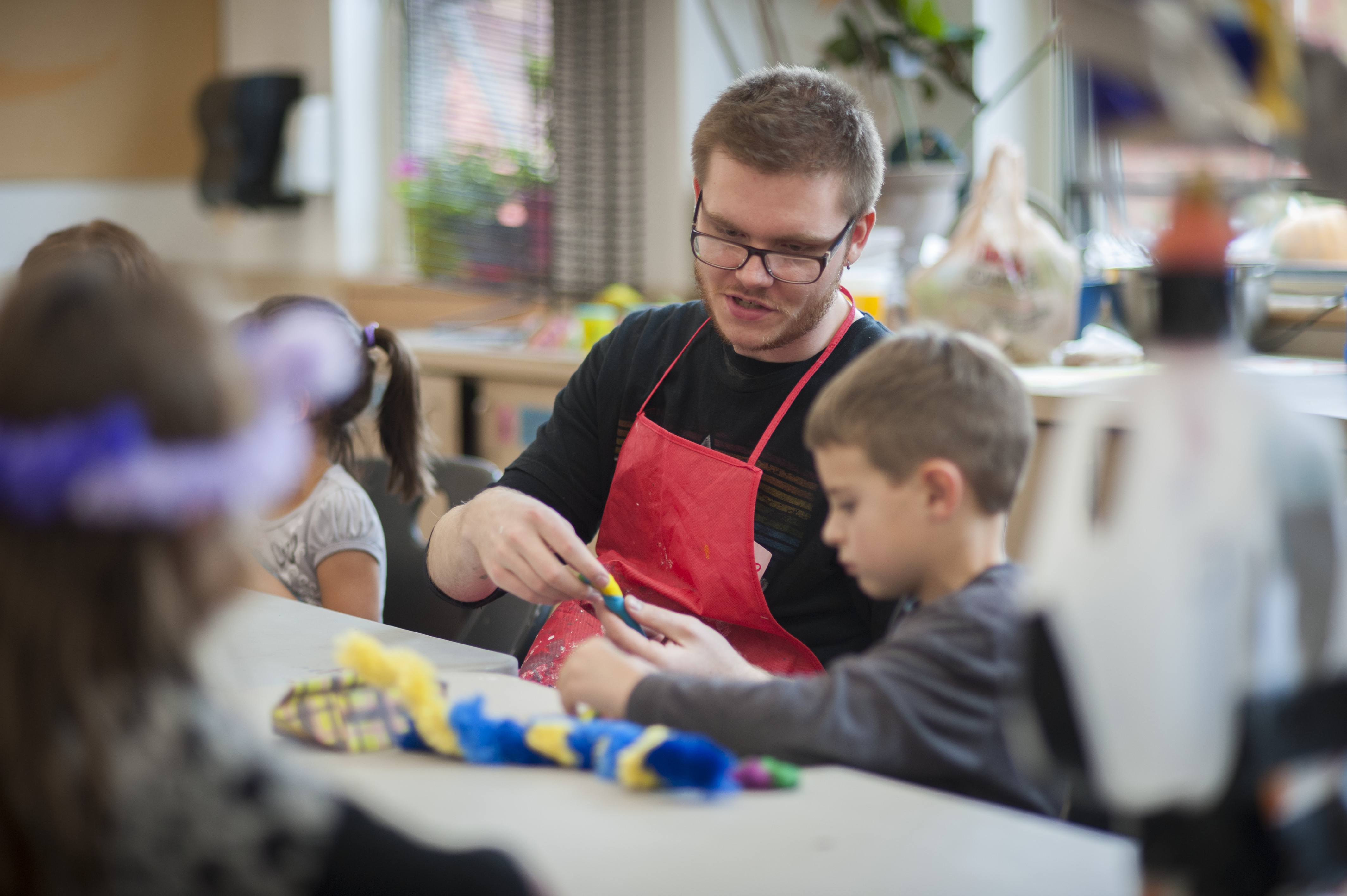 Art Education student teaching kids art.